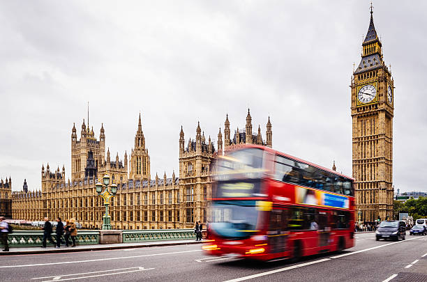 istock London Double Decker Bus Near Big Ben Tower 539272411