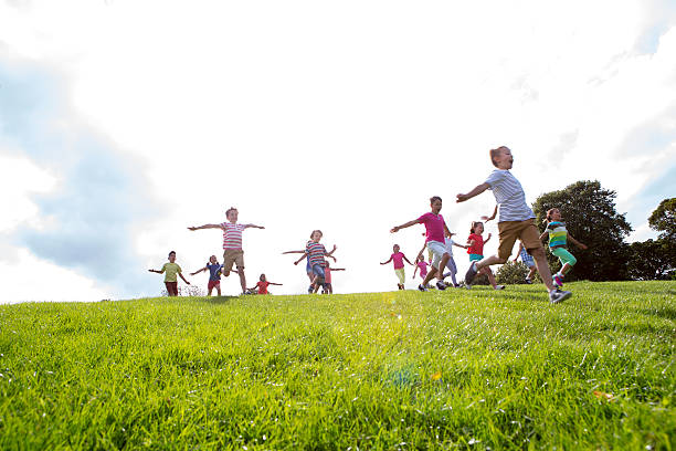 istock Large Group of Children Running 539280323