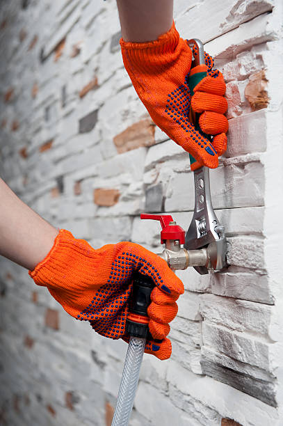 istock Plumber with flexible tape 539281023