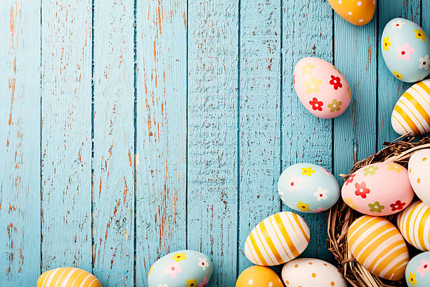 istock Easter Eggs on Old Blue Wood - Season Background Frame 539283047