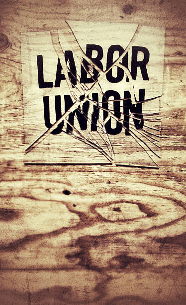 Union Busting: Symbolic Image of broken "Labor Union" stock photo