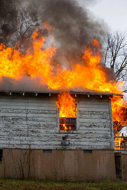 istock House fire flames from roof and window 539292915