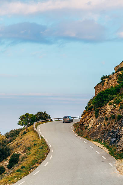 istock Car traveling on the sea coast 539294587