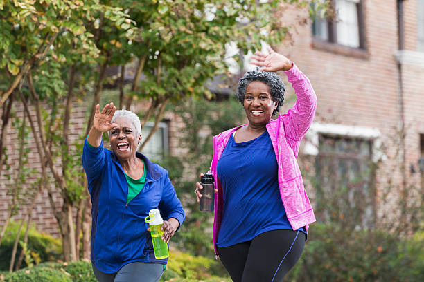 istock Two senior black women walking for exercise 539294865