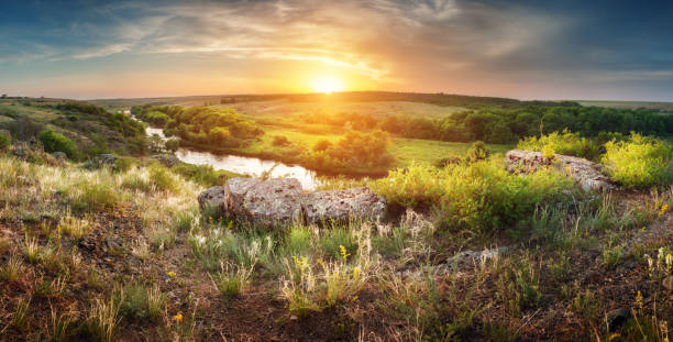 istock Beautiful summer sunset at the river with reflection 539294935