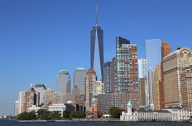 Lower Manhattan with One World Trade Center New York, USA - October 03, 2014: Skyline of Lower Manhattan with Freedom Tower.  großunternehmen stock pictures, royalty-free photos & images