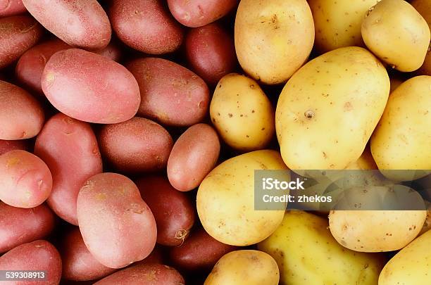 Raw Potatoes Background Stock Photo - Download Image Now - Red Potato, Yellow, 2015