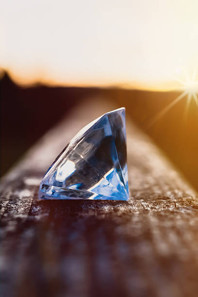 Diamond on a wooden beam stock photo