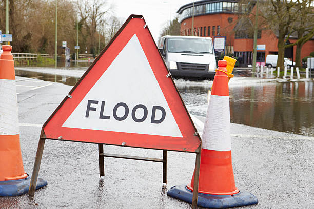 istock Warning Traffic Sign On Flooded Road 539324065