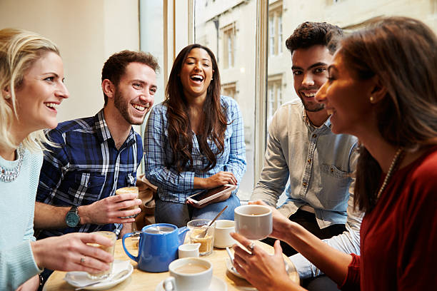 istock Group Of Friends In Caf Using Digital Devices 539325755