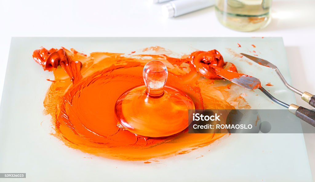 Grinding Mulling Red Orange Oil Paint With A Muller Stock Photo - Download  Image Now - iStock