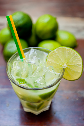 Glass of caipirinha. Famous brazilian cocktail made of cachaça, sugar and lime.