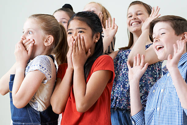 istock Group Of Children Enjoying Drama Class Together 539326706