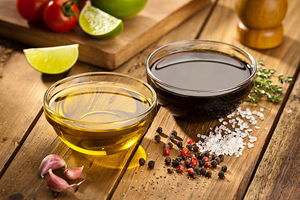 istock Vinaigrette ingredients on rustic wood table 539326779