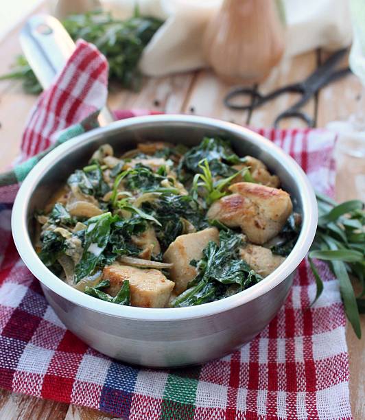 istock chicken in a creamy sauce with spinach and tarragon 539326832