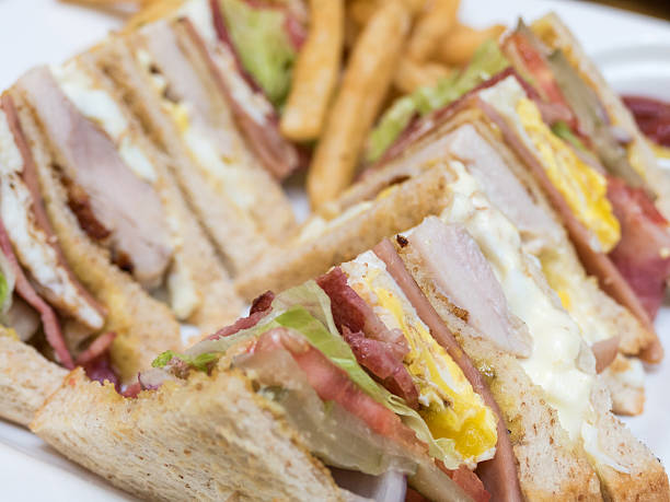 istock Club sandwich on white plate 539328212