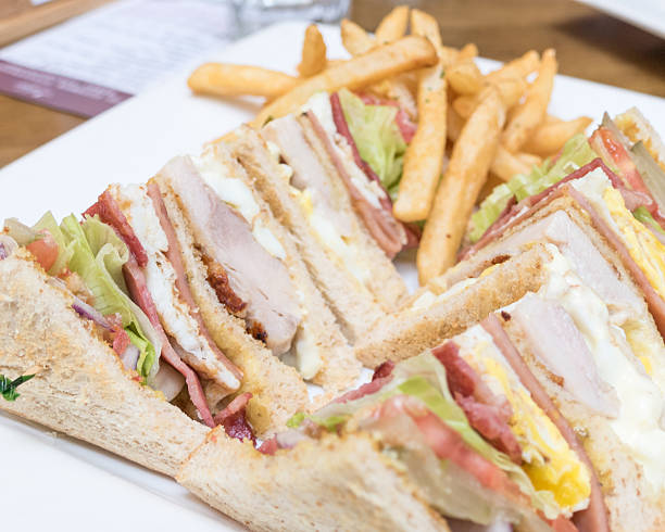 istock Club sandwich on white plate 539328258