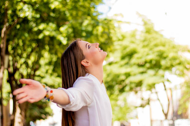 istock Deep breath. Girl's hands against the sky 539329318