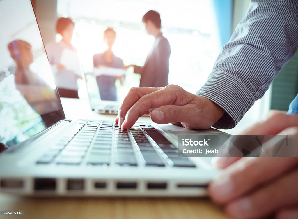 Teamwork meeting concept. Young man and woman startups business meeting to discuss the situation on the marketing in the meeting room. Digital Display Stock Photo