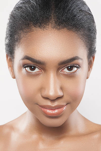 istock Confident african girl caring of her appearance 539330892
