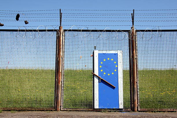 Europe's borders are closed Symbolic European Border illustrating Europe's doors are closed (The barbed wire fence is not at the European border. It's a remainder of the former customs border of the harbour in Hamburg.) horn of africa photos stock pictures, royalty-free photos & images