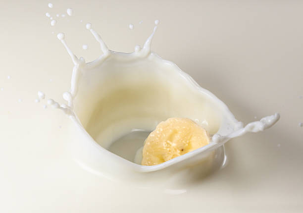 Splashing banana into milk. Shot by using high speed sync.