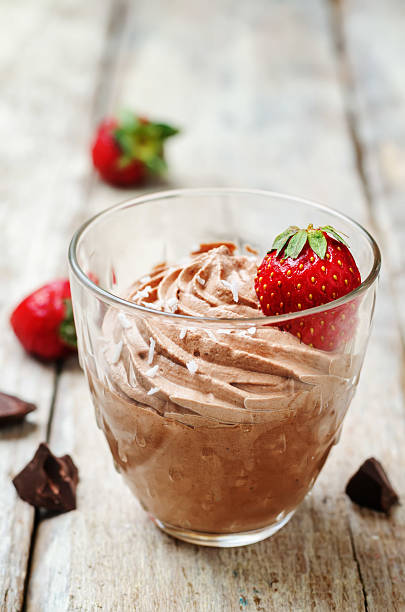 istock chocolate mousse with strawberries and coconut 539336970