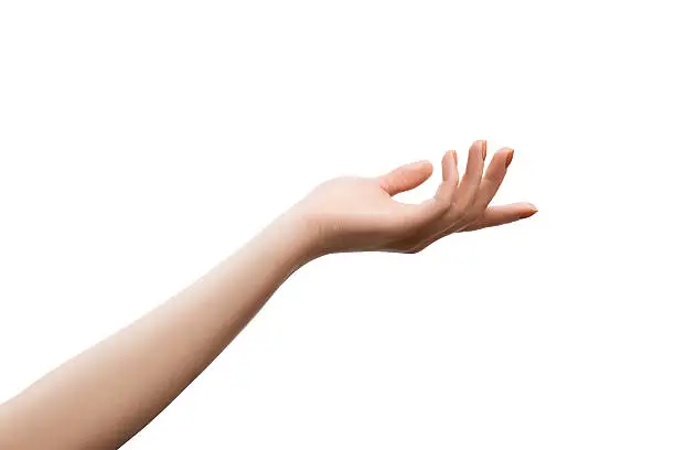 Well retouched female hand giving of getting something. Object isolated on white with clipping paths