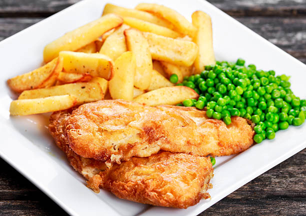 istock British Traditional Fish and chips with peas 539338750