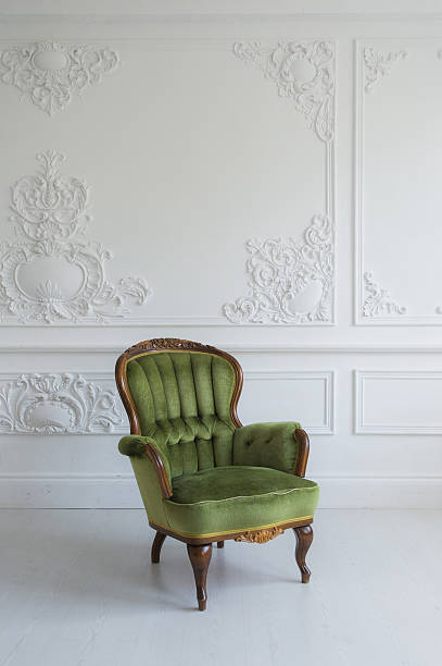 istock One classic armchair against a white wall and floor. Copy 539338850