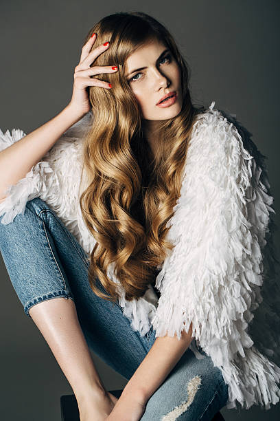 Young woman wearing clothes haute couture