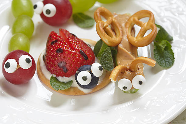 istock Funny beetles from grapes and berries 539341332