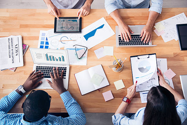 istock Involved colleagues sitting at the table 539341718