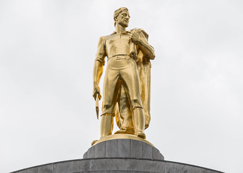 Golden Oregon Pioneer atop the state's capitol building in Salem