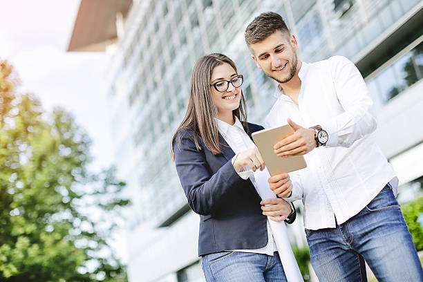 istock Young business couple outoors 539344622