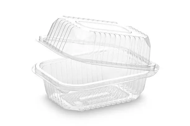 Photo of Disposable plastic food container on white backdrop