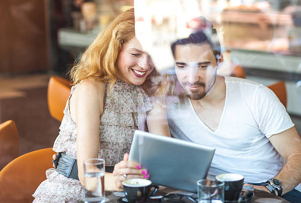 istock Happy young couple at the coffee bar 539346607