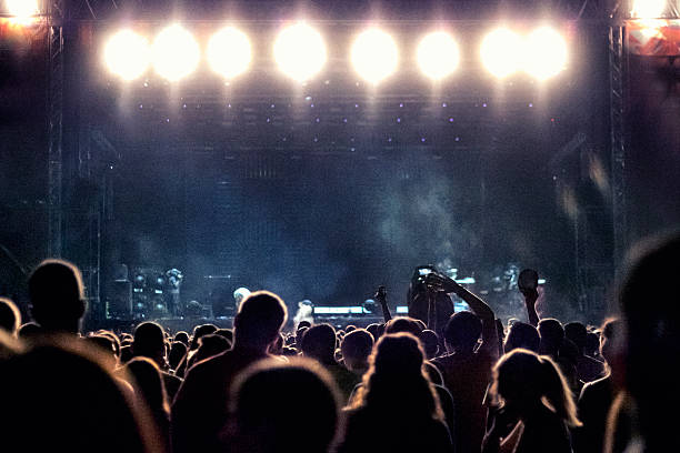 istock People at concert party 539347239
