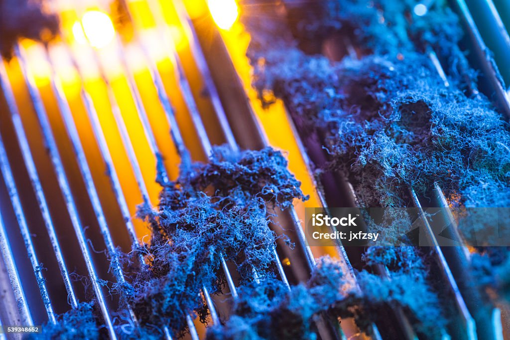 CPU radiator with dust illuminated by light CPU Stock Photo