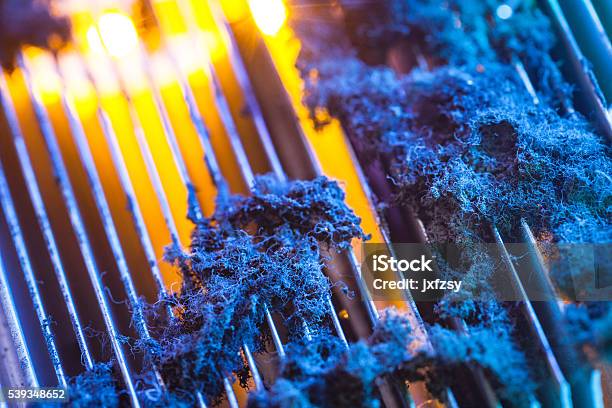 Cpu Radiator With Dust Illuminated By Light Stock Photo - Download Image Now - CPU, Dust, Air Duct