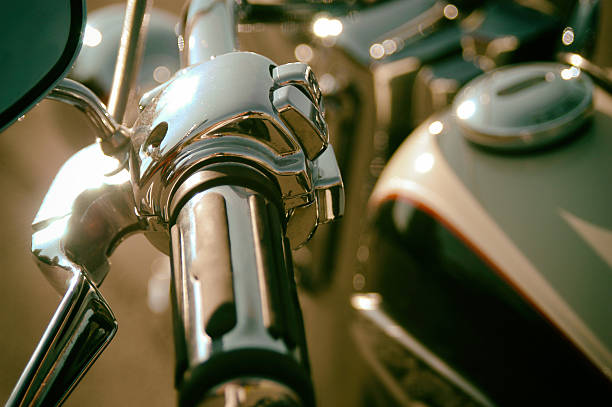 Classic retro motorbike, vintage filter applied. Classic American Motorcycle, close up of throttle and gas tank and side view mirror. throttle stock pictures, royalty-free photos & images