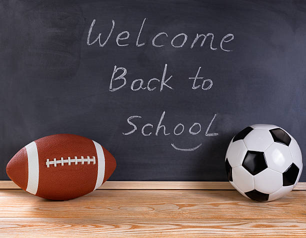 istock Sports equipment with black chalkboard in background 539351490