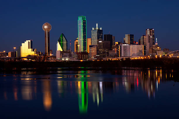 Dallas Texas at Night Downtowwn Dallas, Texas at night with the Trinity River in the forground dallas texas stock pictures, royalty-free photos & images