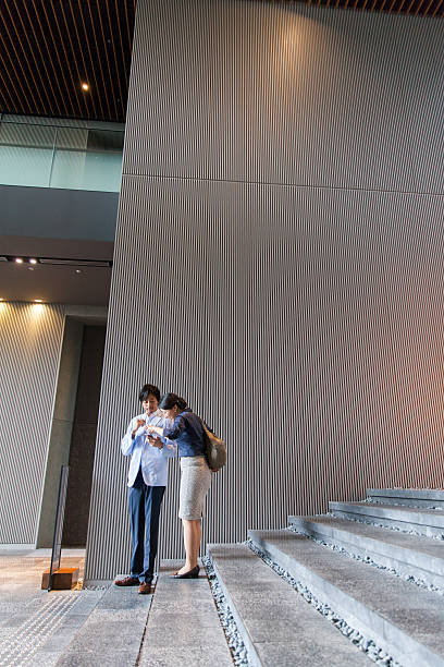 istock the business people talking at office lobby 539353206