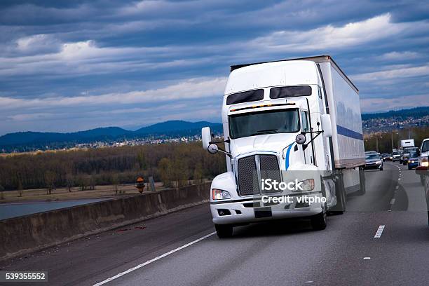 Big Rig American Semi Truck Carring Cargo On Highway Stock Photo - Download Image Now