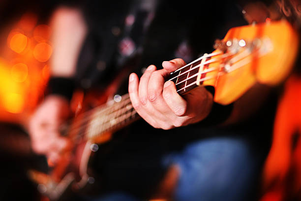 istock Playing electric bass guitar 539357913