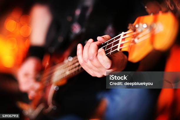 Playing Electric Bass Guitar Stock Photo - Download Image Now - Bass Guitar, 2015, Bass Instrument