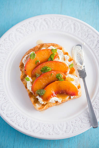 Toast with Goat Creem Cheese and Poached Nectarine