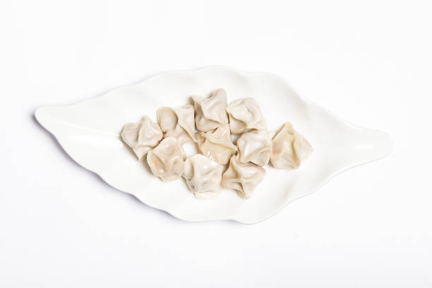 istock Boiled dumplings on white background，Top view of Boiled dumplings 539359202