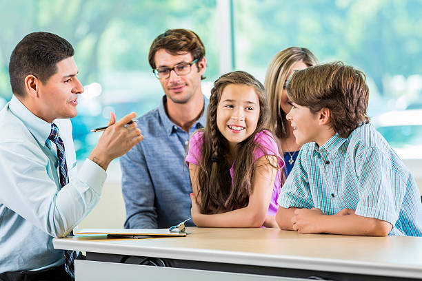 istock Hispanic Teacher meeting with Family 539359996